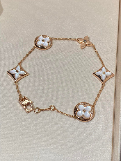 [Elite]STAR AND SUN 5 MOTIF MOP PINK GOLD BRACELET