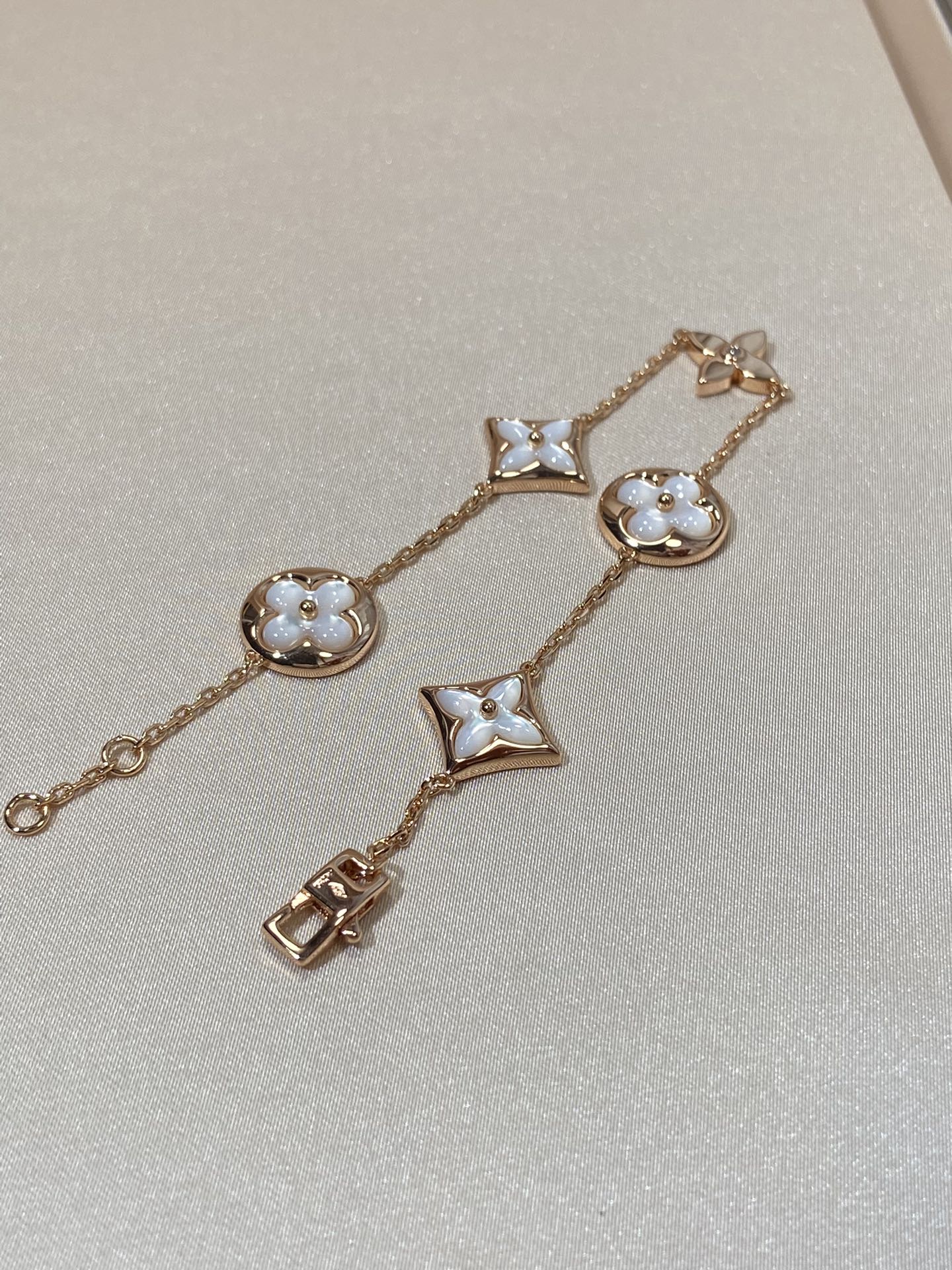 [Elite]STAR AND SUN 5 MOTIF MOP PINK GOLD BRACELET