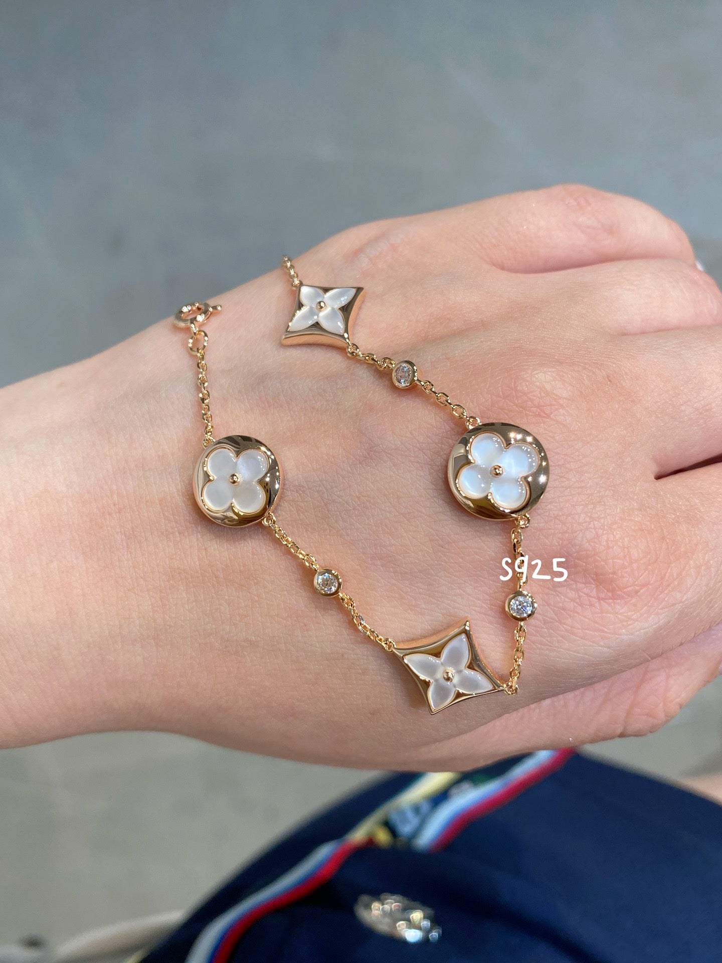 [Elite]STAR AND SUN 4 MOTIF WHITE MOP PINK GOLD BRACELET