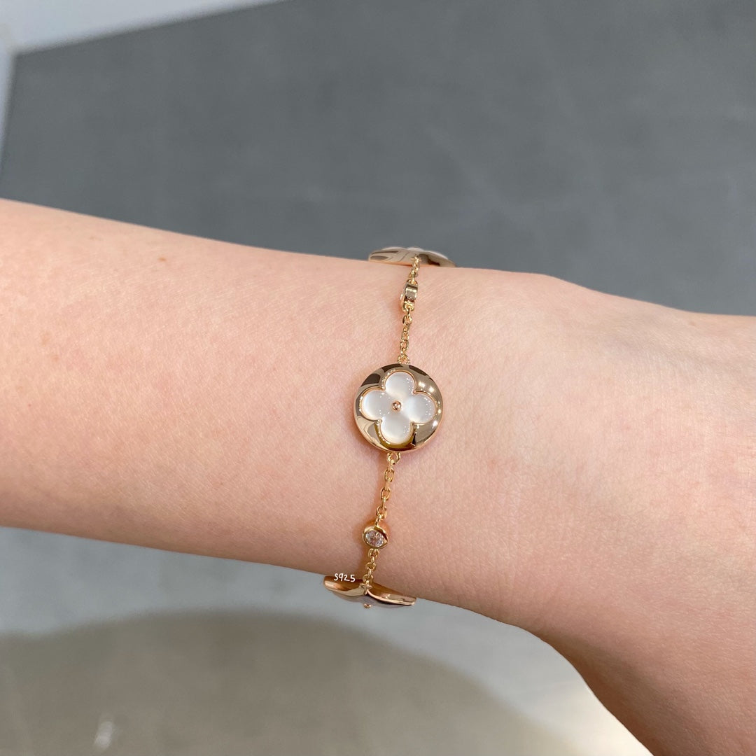 [Elite]STAR AND SUN 4 MOTIF WHITE MOP PINK GOLD BRACELET