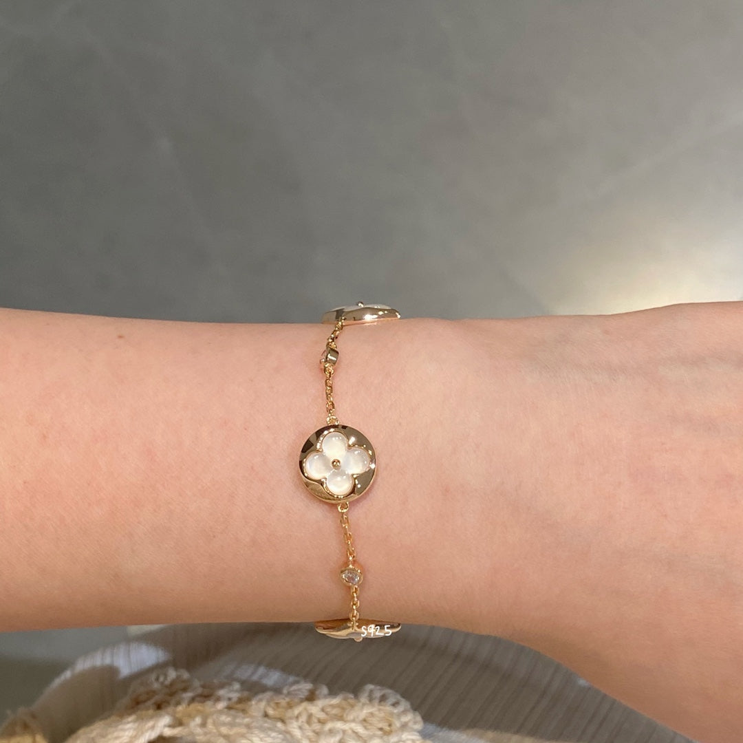 [Elite]STAR AND SUN 4 MOTIF WHITE MOP PINK GOLD BRACELET