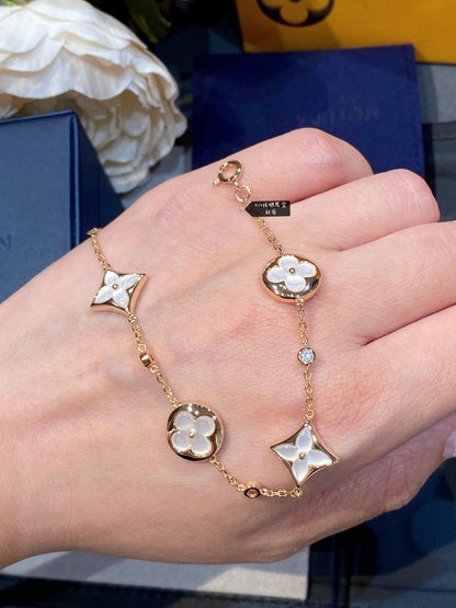 [Elite]STAR AND SUN 4 MOTIF WHITE MOP PINK GOLD BRACELET