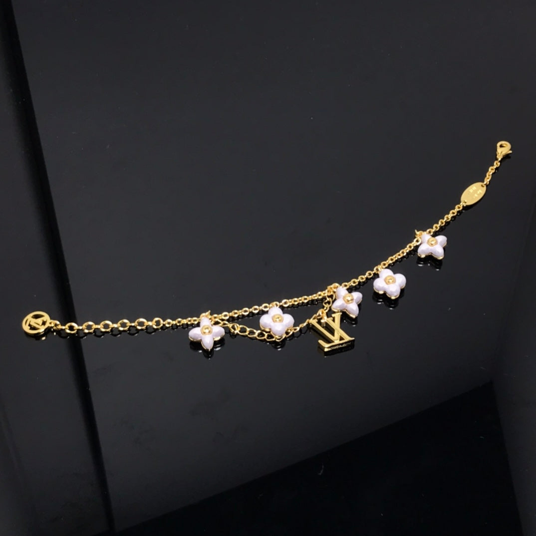 [Elite]LOGO 6 MOTIF STAR AND SUN GOLD BRACELET